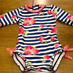 Girl size 0-6 months bathing suits.